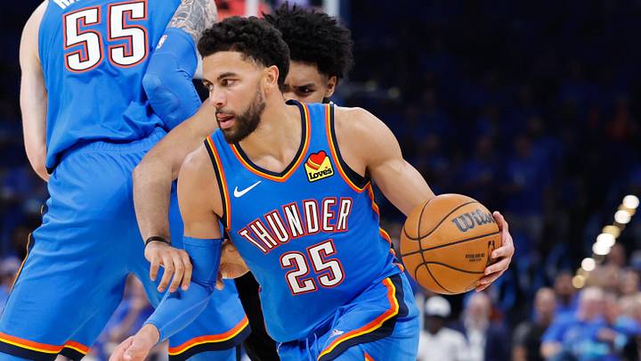 May 18, 2026; Oklahoma City, Oklahoma, USA; Oklahoma City Thunder guard Ajay Mitchell (25) drives the ball in the third quarter against the San Antonio Spurs during game one of the western conference finals for the 2026 NBA playoffs at Paycom Center. Mandatory Credit: Alonzo Adams-Imagn Images