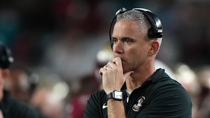 Dec 30, 2023; Miami Gardens, FL, USA; Florida State Seminoles head coach Mike Norvell reacts against the Georgia Bulldogs during the second half in the 2023 Orange Bowl at Hard Rock Stadium. Mandatory Credit: Jasen Vinlove-Imagn Images Dec 30, 2023; Miami Gardens, FL, USA; Florida State Seminoles head coach Mike Norvell reacts against the Georgia Bulldogs during the second half in the 2023 Orange Bowl at Hard Rock Stadium. Mandatory Credit: Jasen Vinlove-Imagn Images