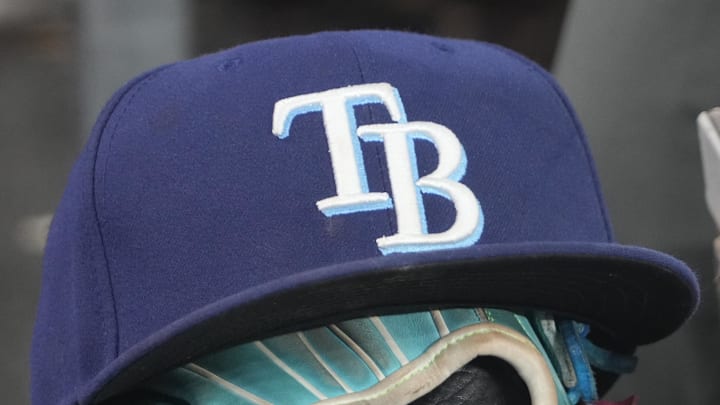 Sep 26, 2025; Toronto, Ontario, CAN; The hat and glove of Tampa Bay Rays third baseman Junior Caminero (13) in the dugout during the game against the Toronto Blue Jays at Rogers Centre. Sep 26, 2025; Toronto, Ontario, CAN; The hat and glove of Tampa Bay Rays third baseman Junior Caminero (13) in the dugout during the game against the Toronto Blue Jays at Rogers Centre.
