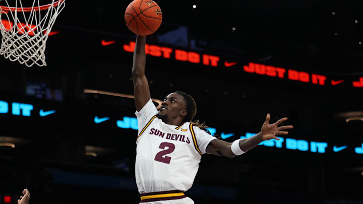 Dec 6, 2025; Phoenix, Arizona, USA; Arizona State University Sun Devils guard Anthony Johnson (2) dunks over Oklahoma University Sooners guard Jadon Jones (12) in the second half at PHX Arena. Mandatory Credit: Anna Carrington-Imagn Images Dec 6, 2025; Phoenix, Arizona, USA; Arizona State University Sun Devils guard Anthony Johnson (2) dunks over Oklahoma University Sooners guard Jadon Jones (12) in the second half at PHX Arena. Mandatory Credit: Anna Carrington-Imagn Images