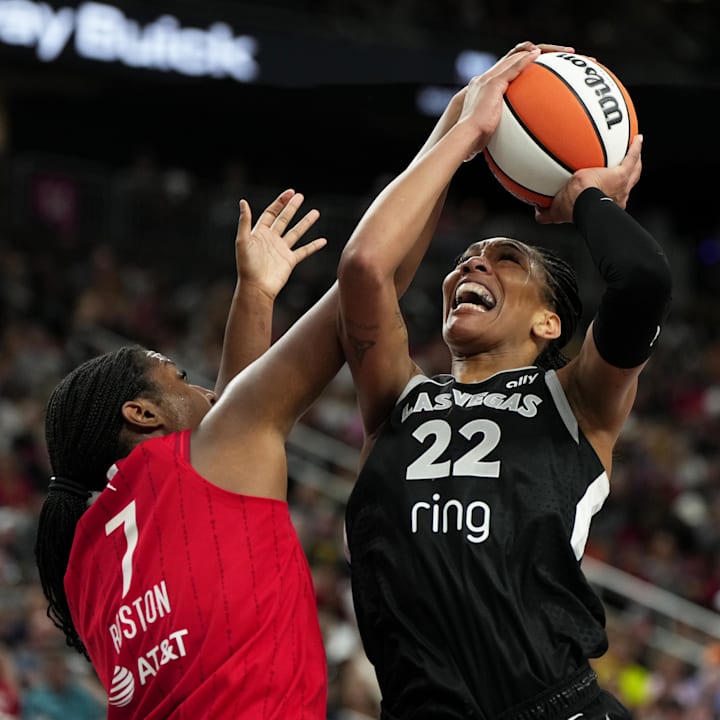 Las Vegas Aces center A'ja Wilson (22) battles for the ball against Indiana Fever center Aliyah Boston (7) on June 22, 2025