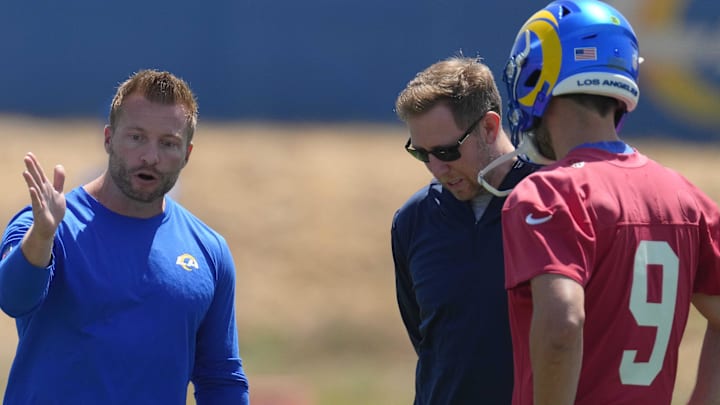 May 23, 2022; Thousand Oaks, CA, USA; Los Angeles Rams coach Sean McVay (left), offensive coordinator Liam Coen (center) and quarterback Matthew Stafford (9) during organized team activities at California Lutheran University. Mandatory Credit: Kirby Lee-Imagn Images