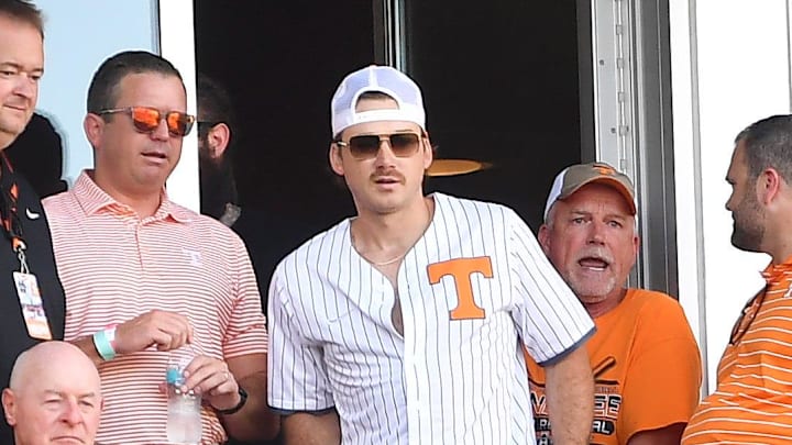 Country music singer Morgan Wallen, in the stands during game three of the NCAA College World Series finals between Tennessee and Texas A&M. Country music singer Morgan Wallen, in the stands during game three of the NCAA College World Series finals between Tennessee and Texas A&M.