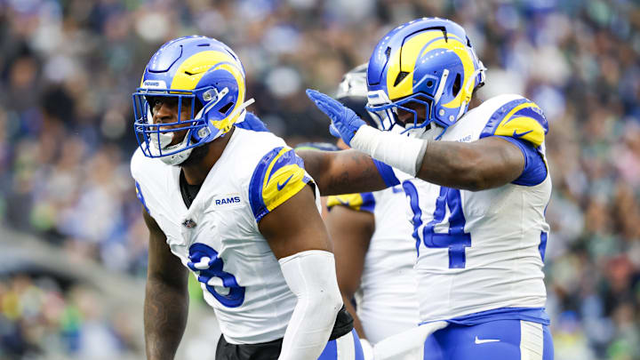Nov 3, 2024; Seattle, Washington, USA; Los Angeles Rams linebacker Jared Verse (8) celebrates with cornerback Cobie Durant (14) after a sack against the Seattle Seahawks during the second quarter at Lumen Field. Mandatory Credit: Joe Nicholson-Imagn Images Nov 3, 2024; Seattle, Washington, USA; Los Angeles Rams linebacker Jared Verse (8) celebrates with cornerback Cobie Durant (14) after a sack against the Seattle Seahawks during the second quarter at Lumen Field. Mandatory Credit: Joe Nicholson-Imagn Images