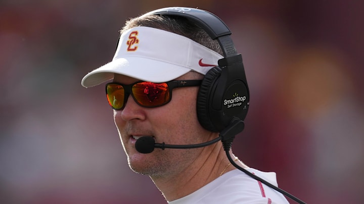 Nov 30, 2024; Los Angeles, California, USA; Southern California Trojans head coach Lincoln Riley reacts against the Notre Dame Fighting Irish in the second half at United Airlines Field at Los Angeles Memorial Coliseum. Mandatory Credit: Kirby Lee-Imagn Images