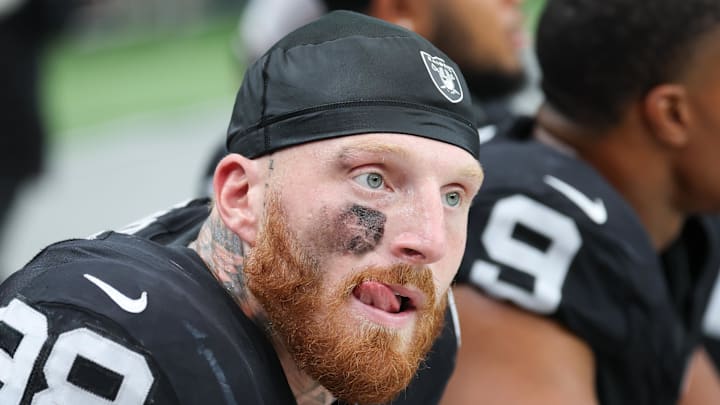 Sep 28, 2025; Paradise, Nevada, USA; Las Vegas Raiders defensive end Maxx Crosby (98) looks on from the sideline during the first quarter against the Chicago Bears at Allegiant Stadium. Mandatory Credit: Kiyoshi Mio-Imagn Images