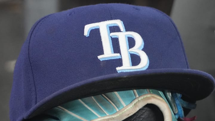 Sep 26, 2025; Toronto, Ontario, CAN; The hat and glove of Tampa Bay Rays third baseman Junior Caminero (13) in the dugout during the game against the Toronto Blue Jays at Rogers Centre. Sep 26, 2025; Toronto, Ontario, CAN; The hat and glove of Tampa Bay Rays third baseman Junior Caminero (13) in the dugout during the game against the Toronto Blue Jays at Rogers Centre.