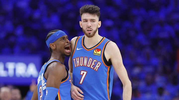 May 22, 2025; Oklahoma City, Oklahoma, USA; Oklahoma City Thunder guard Shai Gilgeous-Alexander (2) and forward Chet Holmgren (7) celebrate after a play against the Minnesota Timberwolves in the third quarter during game two of the western conference finals for the 2025 NBA Playoffs at Paycom Center. Mandatory Credit: Alonzo Adams-Imagn Images
