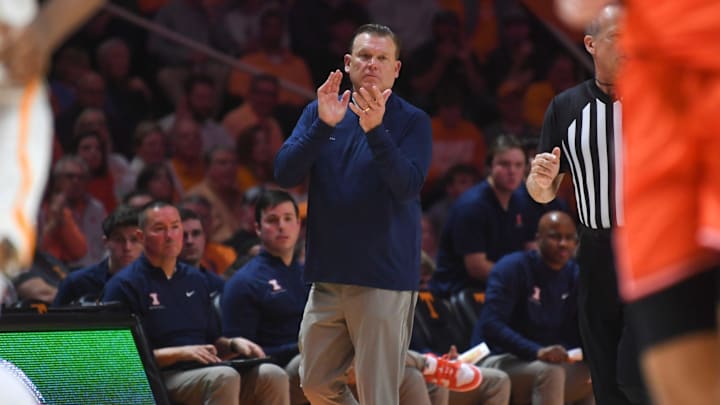 Illinois head coach Brad Underwood claps from the sidelines during an NCAA college basketball game between Tennessee and Illinois at Thompson-Boling Arena at Food City Center, Saturday, Dec. 9, 2023.