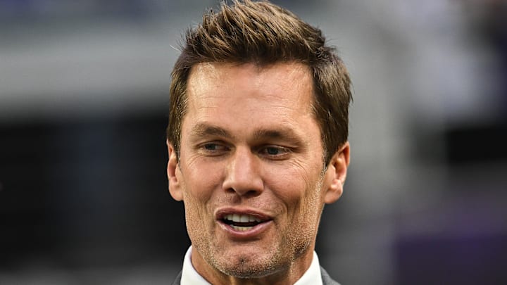 Dec 29, 2024; Minneapolis, Minnesota, USA; FOX broadcaster and former NFL quarterback Tom Brady looks on before the game between the Minnesota Vikings and the Green Bay Packers at U.S. Bank Stadium. Mandatory Credit: Jeffrey Becker-Imagn Images Dec 29, 2024; Minneapolis, Minnesota, USA; FOX broadcaster and former NFL quarterback Tom Brady looks on before the game between the Minnesota Vikings and the Green Bay Packers at U.S. Bank Stadium. Mandatory Credit: Jeffrey Becker-Imagn Images