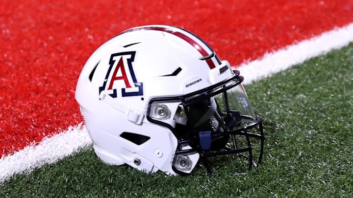 Sep 2, 2023; Tucson, Arizona, USA; Arizona Wildcats quarterback Jayden de Laura (7) helmet on the field after a victory over Northern Arizona Lumberjacks at Arizona Stadium. Mandatory Credit: Zac BonDurant-Imagn Images