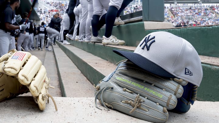 Feb 25, 2025; Fort Myers, Florida, USA; Detail view of gloves and a hat in the New York Yankees dugout during the game against the Minnesota Twins at Lee Health Sports Complex. Mandatory Credit: Chris Tilley-Imagn Images Feb 25, 2025; Fort Myers, Florida, USA; Detail view of gloves and a hat in the New York Yankees dugout during the game against the Minnesota Twins at Lee Health Sports Complex. Mandatory Credit: Chris Tilley-Imagn Images