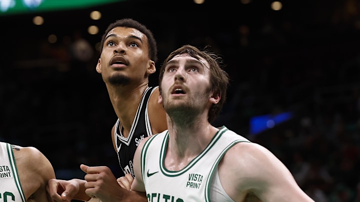 Jan 17, 2024; Boston, Massachusetts, USA; Boston Celtics forward Jayson Tatum (0) and center Luke Kornet (40) box out San Antonio Spurs center Victor Wembanyama (1) during the second half at TD Garden. Jan 17, 2024; Boston, Massachusetts, USA; Boston Celtics forward Jayson Tatum (0) and center Luke Kornet (40) box out San Antonio Spurs center Victor Wembanyama (1) during the second half at TD Garden.