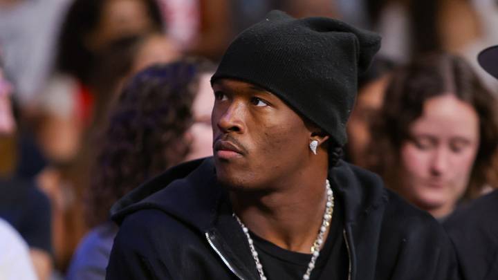 Aug 29, 2025; College Park, Georgia, USA; Atlanta Falcons wide receiver Ray-Ray McCloud III (34) watches a game between the Atlanta Dream and Dallas Wings in the second quarter at Gateway Center Arena at College Park. Mandatory Credit: Brett Davis-Imagn Images