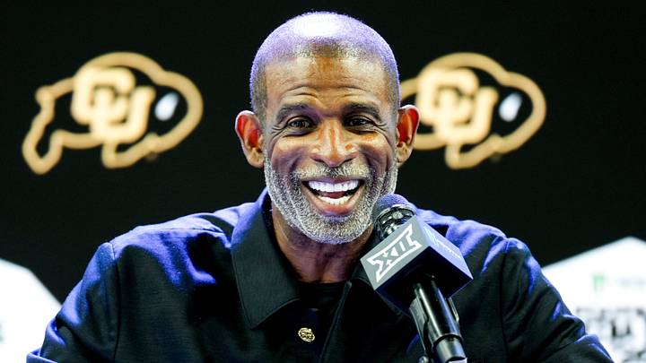 Jul 7, 2026; Frisco, TX, USA; Colorado head coach Deion Sanders speaks to reporters during Big 12 Conference Football Media Days at The Star. Mandatory Credit: Raymond Carlin III-Imagn Images Jul 7, 2026; Frisco, TX, USA; Colorado head coach Deion Sanders speaks to reporters during Big 12 Conference Football Media Days at The Star. Mandatory Credit: Raymond Carlin III-Imagn Images