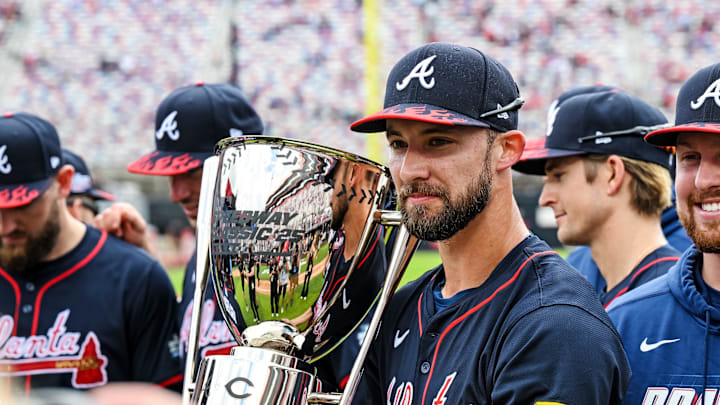 Aug 3, 2025; Bristol, Tennessee, USA; Atlanta Braves outfielder Eli White (36) holds the trophy after the win against Cincinnati Reds at Bristol Motor Speedway. Mandatory Credit: Bryan Lynn-Imagn Images Aug 3, 2025; Bristol, Tennessee, USA; Atlanta Braves outfielder Eli White (36) holds the trophy after the win against Cincinnati Reds at Bristol Motor Speedway. Mandatory Credit: Bryan Lynn-Imagn Images