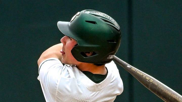 Michigan State's Ryan McKay hits a double against Ohio State during the fifth inning on Friday, April 18, 2025, at McLane Stadium in East Lansing. Michigan State's Ryan McKay hits a double against Ohio State during the fifth inning on Friday, April 18, 2025, at McLane Stadium in East Lansing.