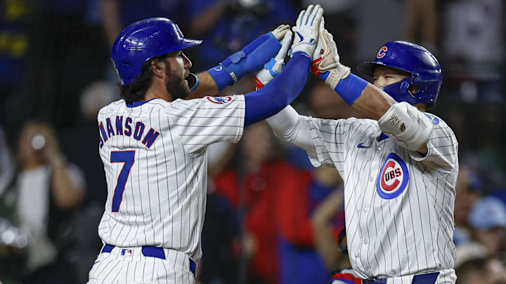 Sep 19, 2024; Chicago, Illinois, USA; Chicago Cubs outfielder Seiya Suzuki (27) celebrates with shortstop Dansby Swanson (7) after hitting a two-run home run against the Washington Nationals during the third inning at Wrigley Field Sep 19, 2024; Chicago, Illinois, USA; Chicago Cubs outfielder Seiya Suzuki (27) celebrates with shortstop Dansby Swanson (7) after hitting a two-run home run against the Washington Nationals during the third inning at Wrigley Field