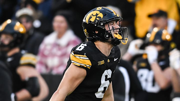 Nov 22, 2025; Iowa City, Iowa, USA; Iowa Hawkeyes defensive back Zach Lutmer (6) reacts after making an interception against the Michigan State Spartans during the second quarter at Kinnick Stadium. Mandatory Credit: Jeffrey Becker-Imagn Images