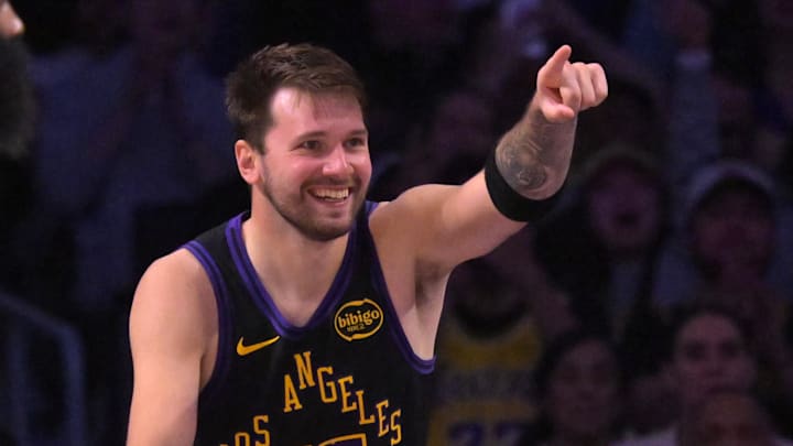 Mar 31, 2026; Los Angeles, California, USA;  Los Angeles Lakers guard Luka Doncic (77) reacts after a basket in the second half against the Cleveland Cavaliers at Crypto.com Arena. Mandatory Credit: Jayne Kamin-Oncea-Imagn Images