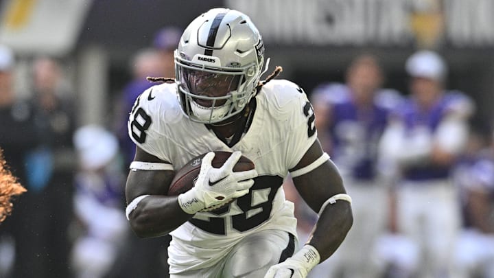 Aug 10, 2024; Minneapolis, Minnesota, USA; Las Vegas Raiders running back Sincere McCormick (28) runs the ball against the Minnesota Vikings during the third quarter at U.S. Bank Stadium. Mandatory Credit: Jeffrey Becker-Imagn Images Aug 10, 2024; Minneapolis, Minnesota, USA; Las Vegas Raiders running back Sincere McCormick (28) runs the ball against the Minnesota Vikings during the third quarter at U.S. Bank Stadium. Mandatory Credit: Jeffrey Becker-Imagn Images
