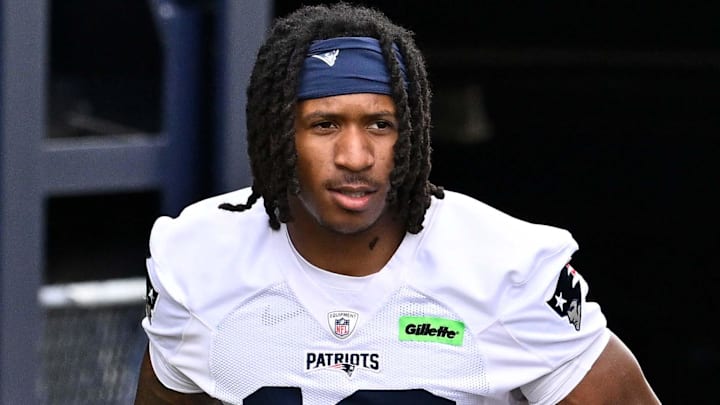 Jun 9, 2025; Foxborough, MA, USA; New England Patriots wide receiver Kyle Williams (18) and New England Patriots wide receiver Jeremiah Webb (29) walk to the practice fields at Gillette Stadium. Mandatory Credit: Eric Canha-Imagn Images