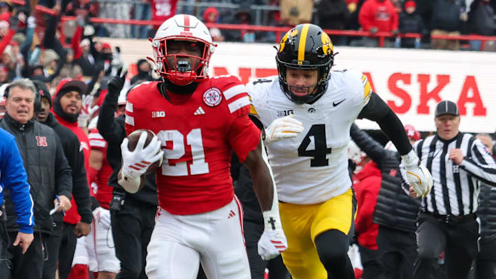 Nebraska running back Emmett Johnson takes off on a 70-yard run against Iowa.