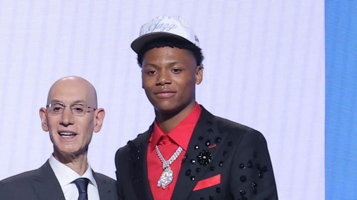 Jun 25, 2025; Brooklyn, NY, USA; Ace Bailey stands with NBA commissioner Adam Silver after being selected as the fifth pick by the Utah Jazz in the first round of the 2025 NBA Draft at Barclays Center. Mandatory Credit: Brad Penner-Imagn Images Jun 25, 2025; Brooklyn, NY, USA; Ace Bailey stands with NBA commissioner Adam Silver after being selected as the fifth pick by the Utah Jazz in the first round of the 2025 NBA Draft at Barclays Center. Mandatory Credit: Brad Penner-Imagn Images