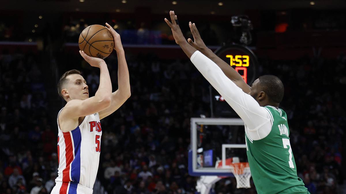 Duncan Robinson wearing Detroit Pistons number 55 and shooting against the Boston Celtics