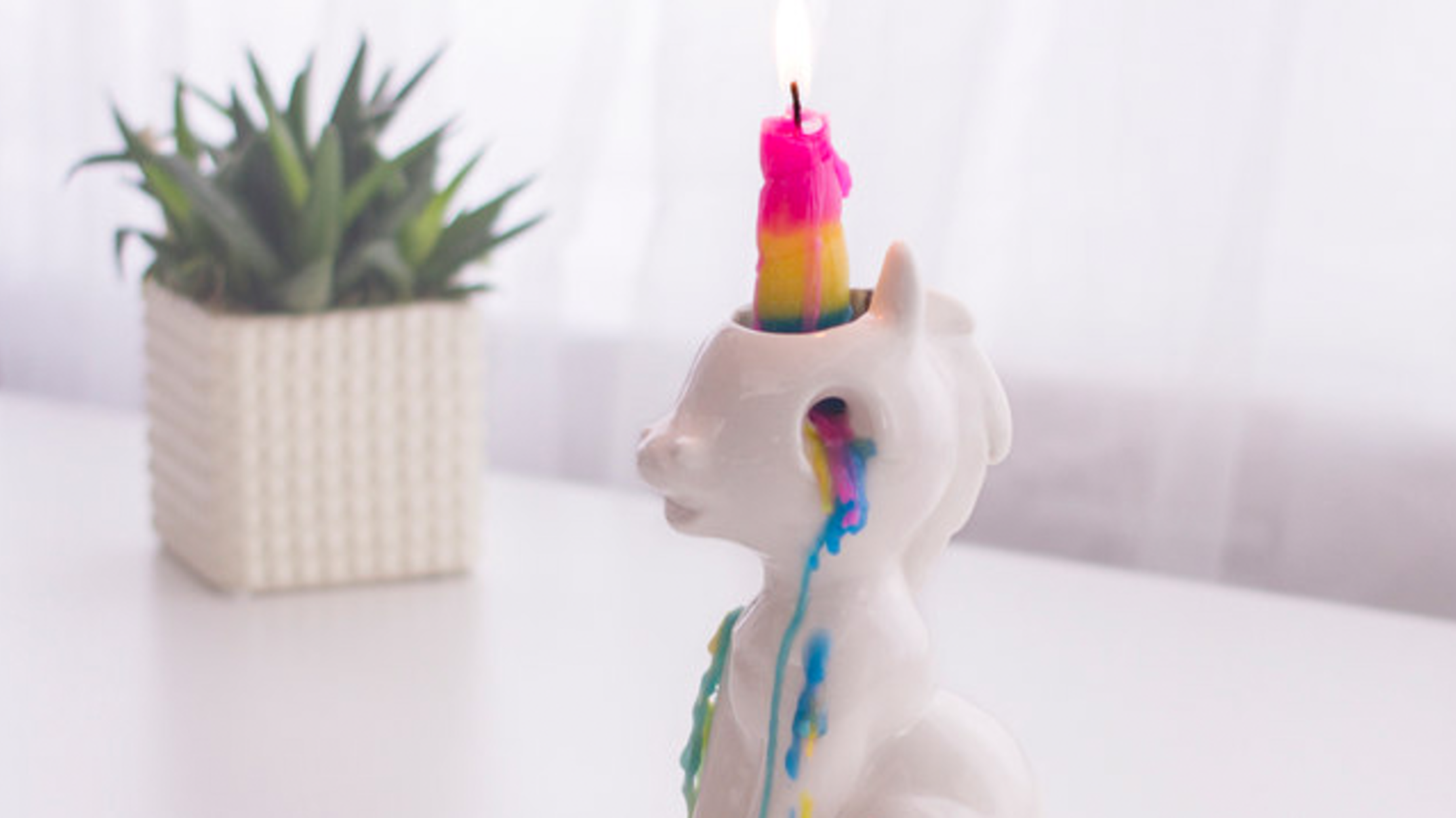 Unicorn Candle Holder Cries Waxy, Rainbow Tears Mental Floss