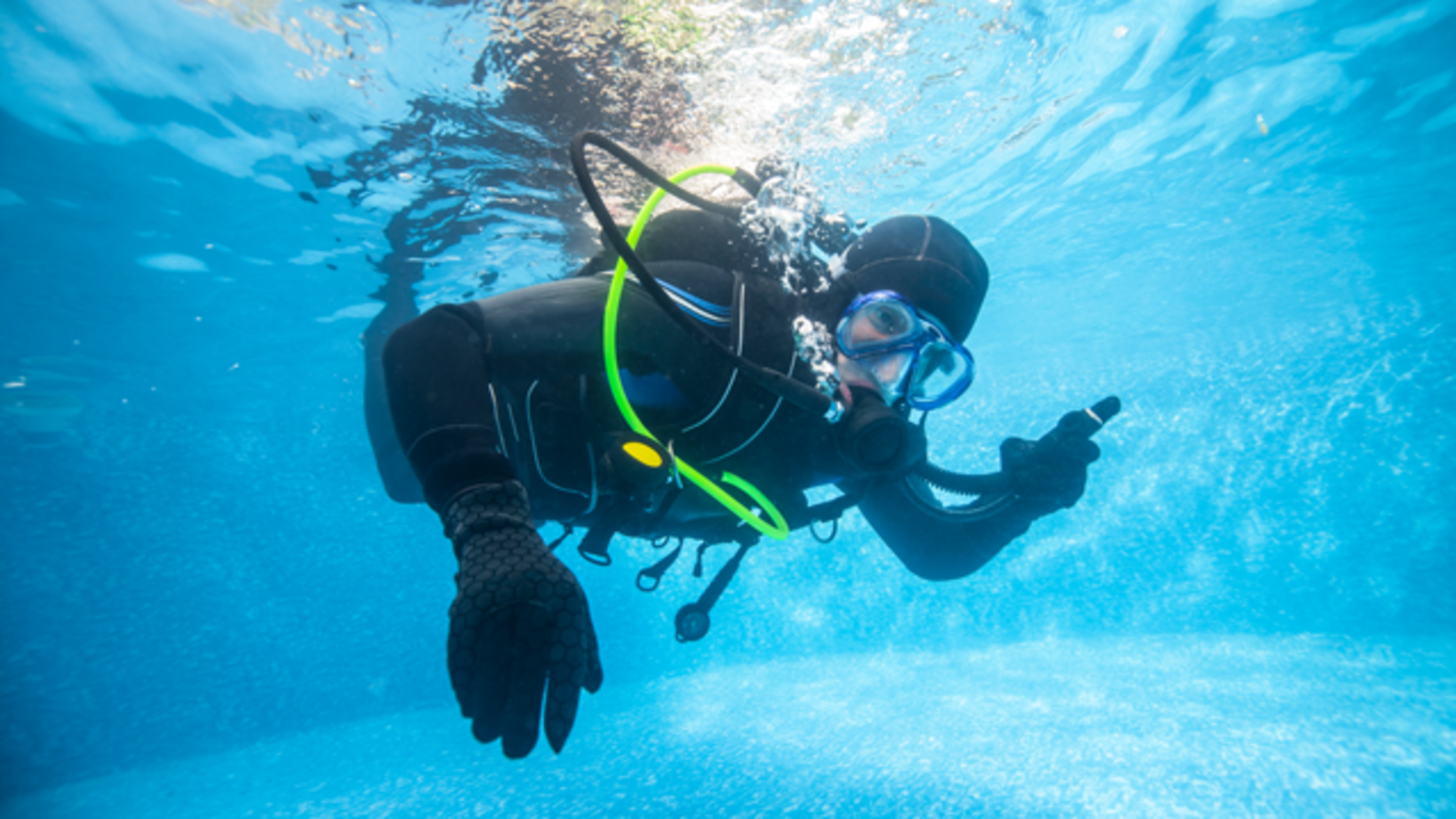 This Restaurant Is Located in an Indoor Diving Pool Mental Floss