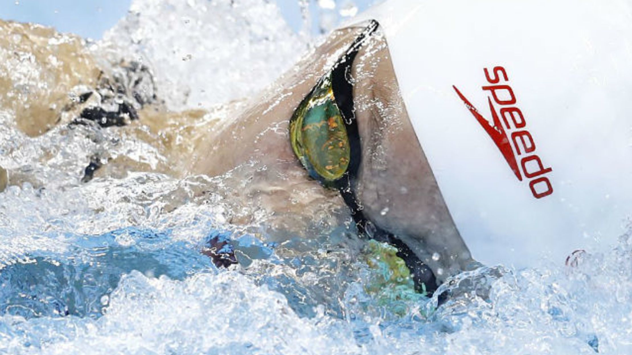 Why Do Olympic Swimmers Wear Two Caps? Mental Floss