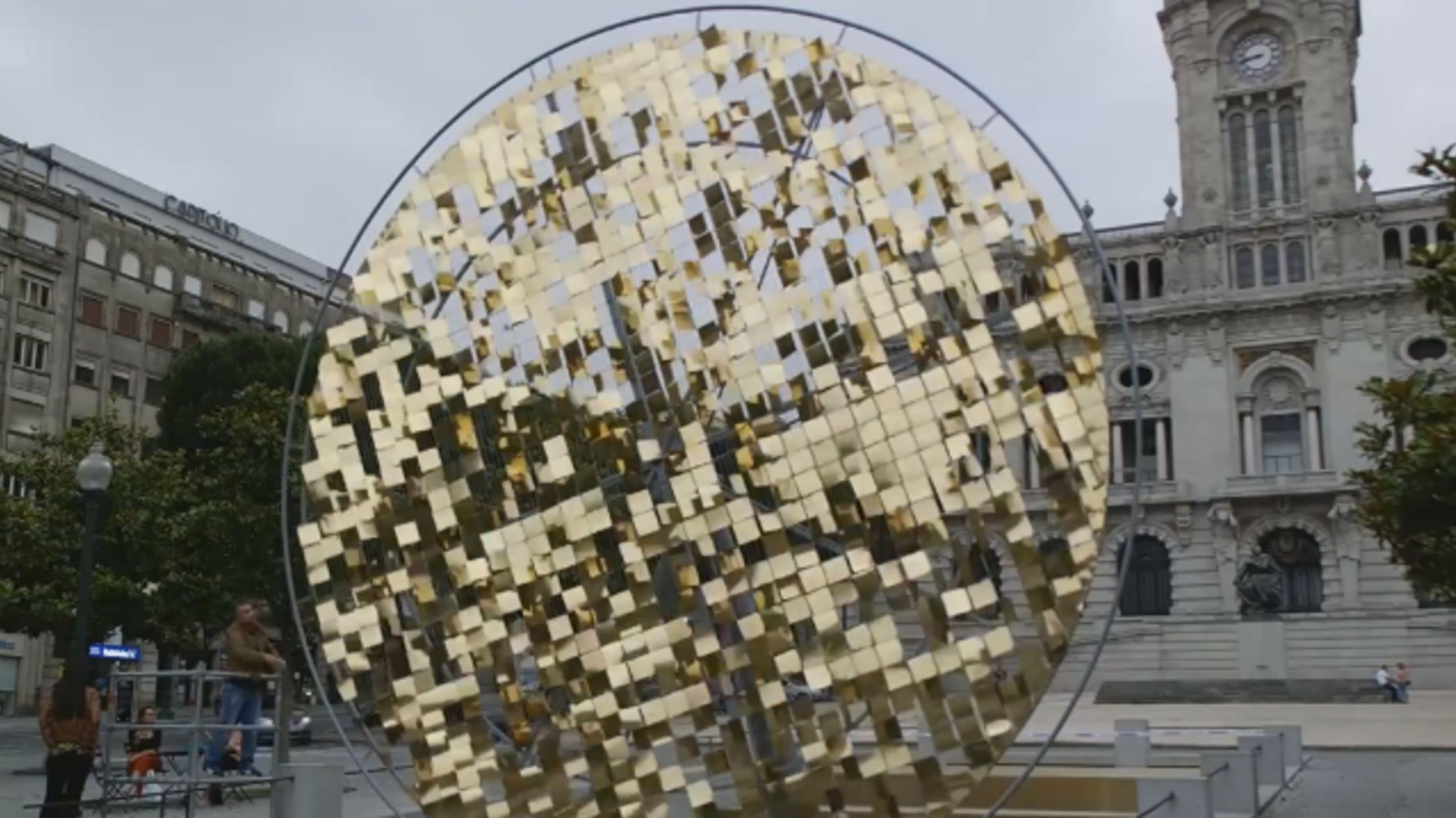 Artists Erect an Enormous, Glittering Sun Wheel in Porto City Center ...