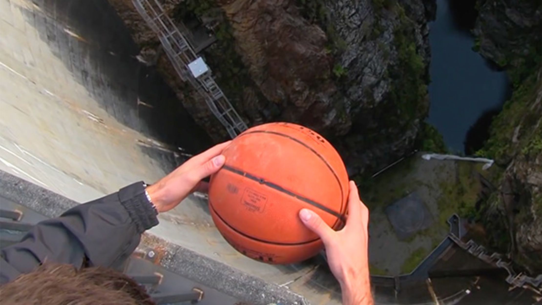 Surprising Science: Dropping Basketballs Off A Dam | Mental Floss