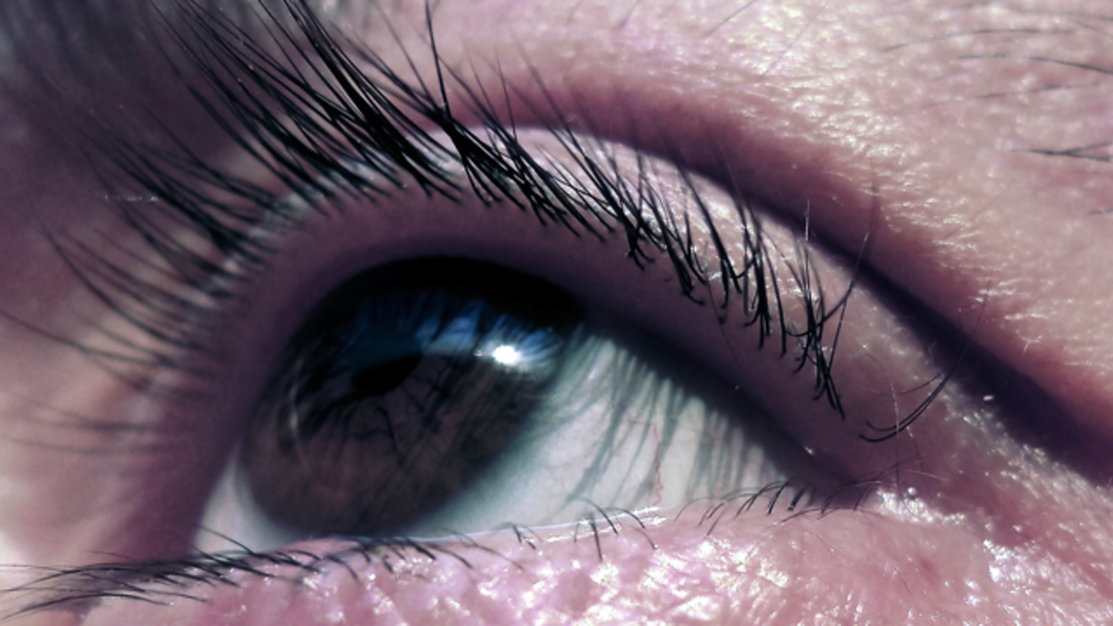 Why Does My Eyelid Sometimes Twitch? Mental Floss