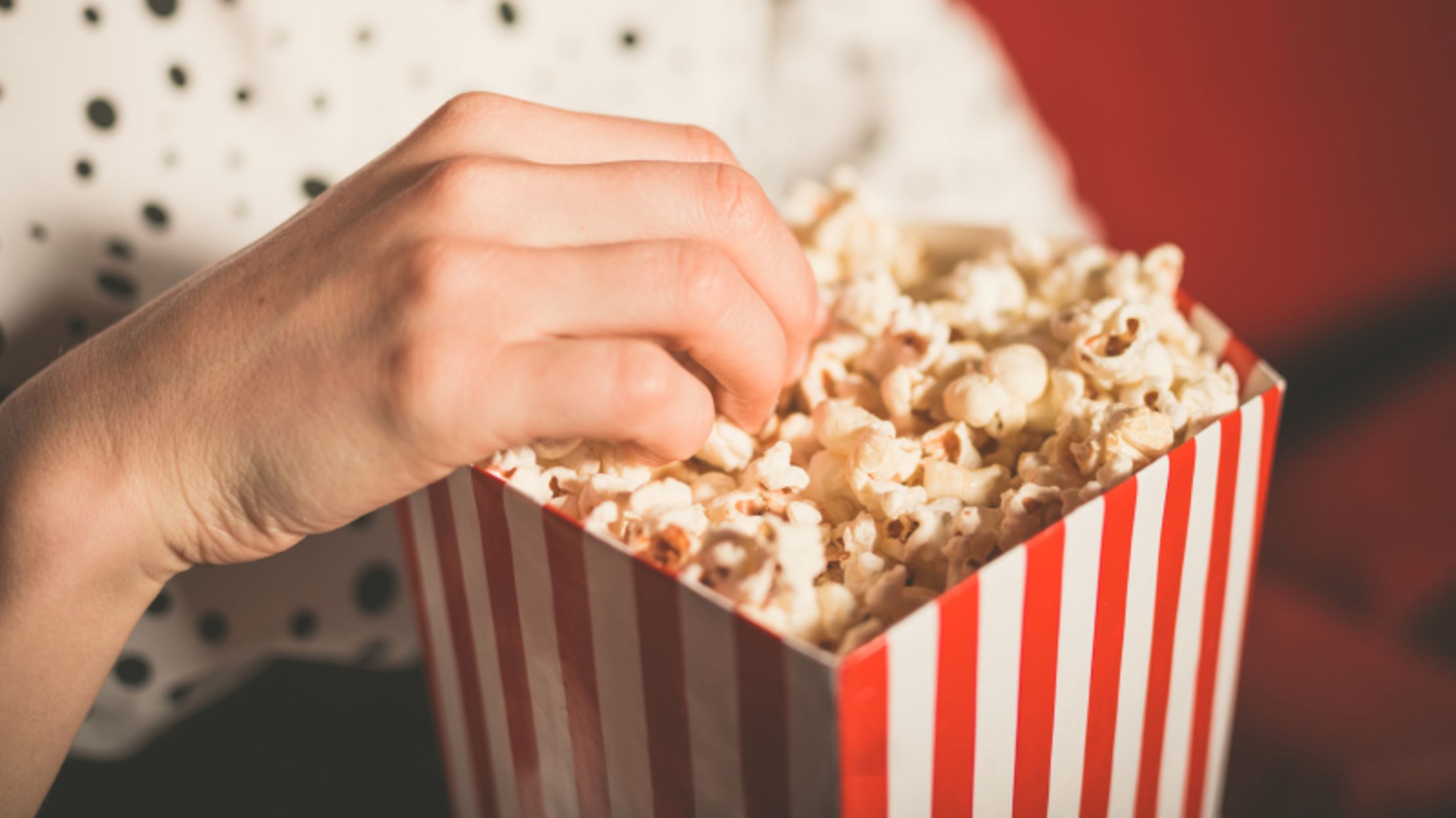 Why Do We Eat Popcorn at the Movies? Mental Floss