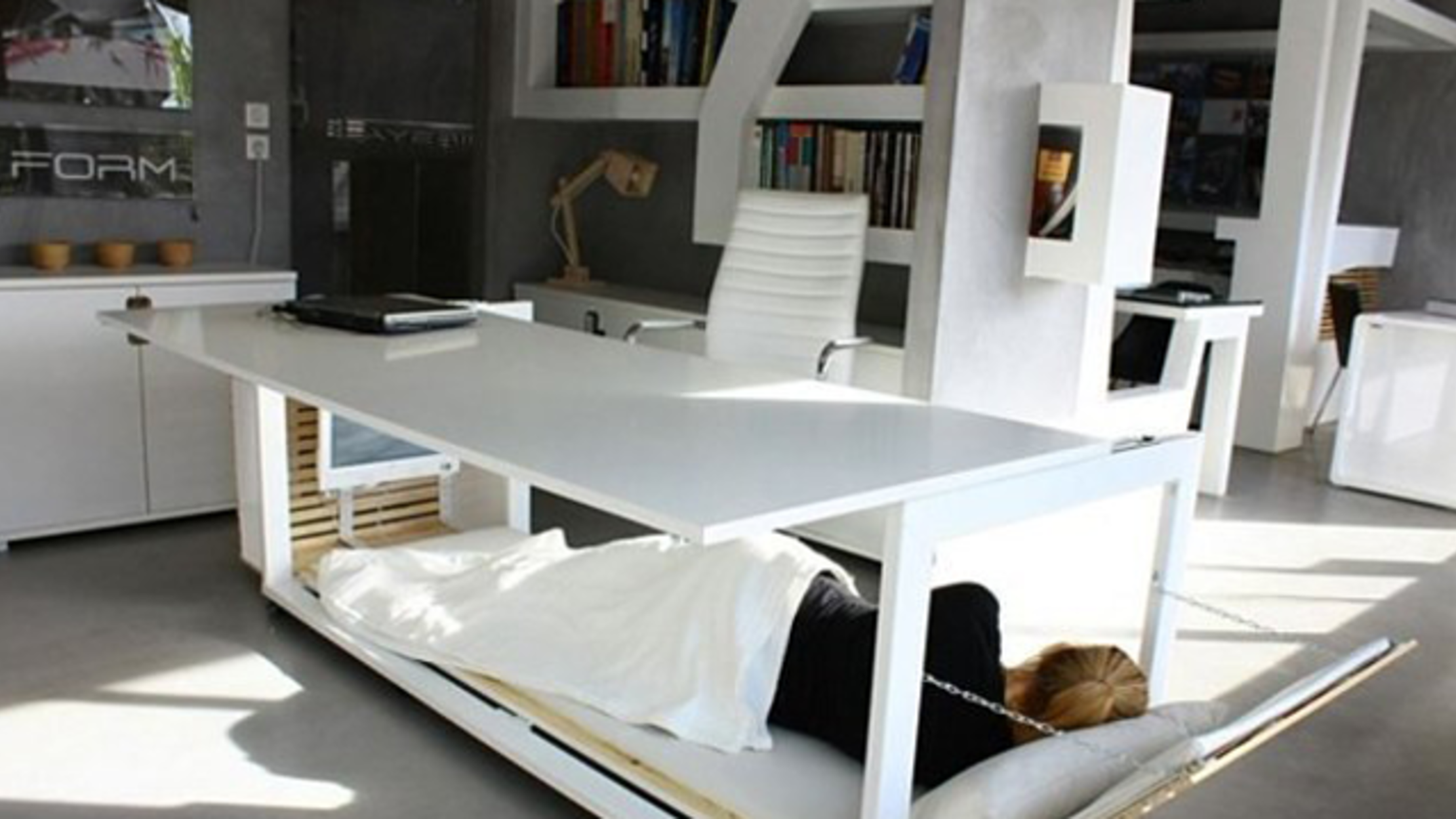 Power Nap In The Office Like A Pro With This Desk That Turns Into