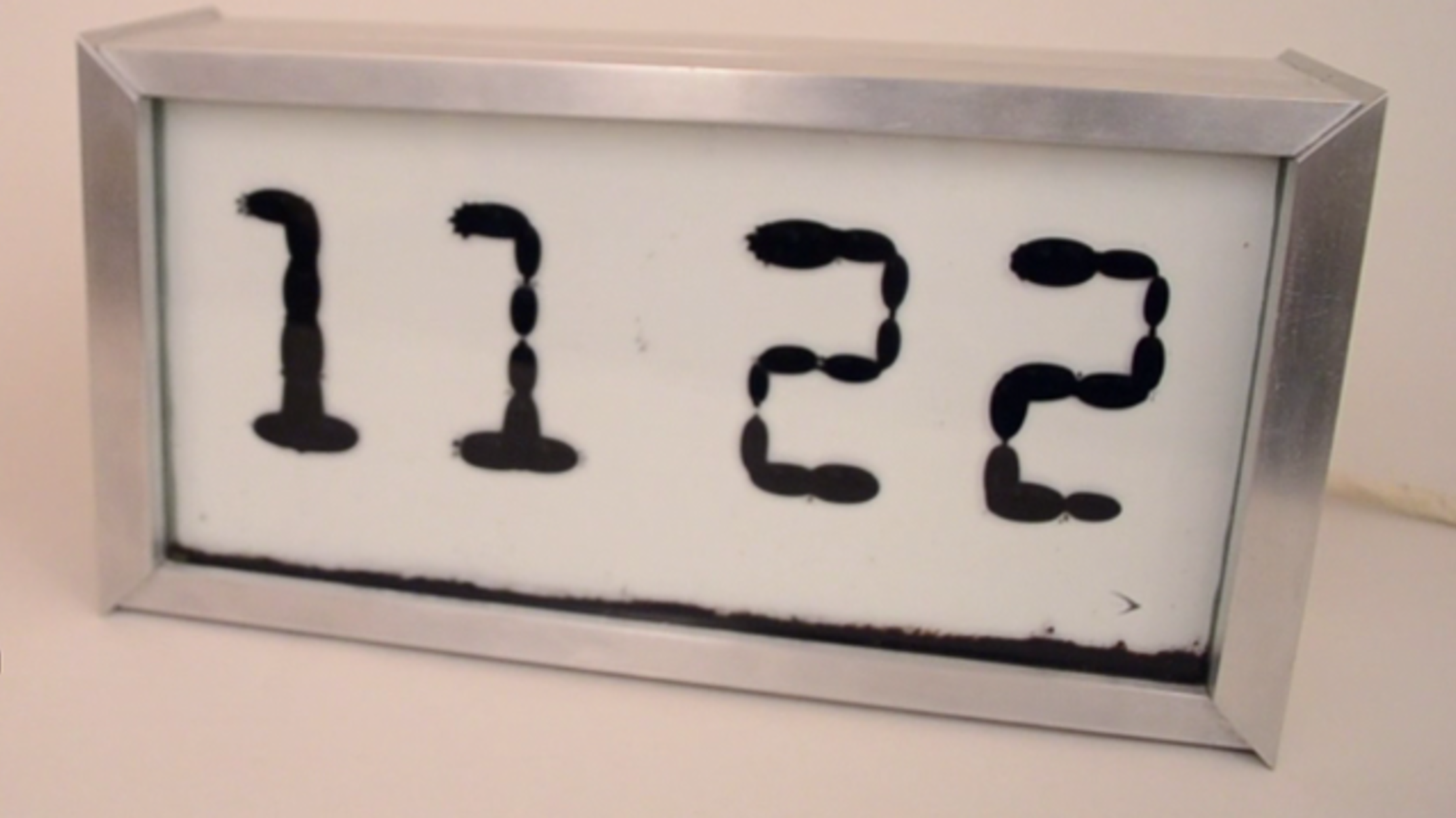 This Clock Tells Time With Lively Blobs And Electromagnets Mental Floss