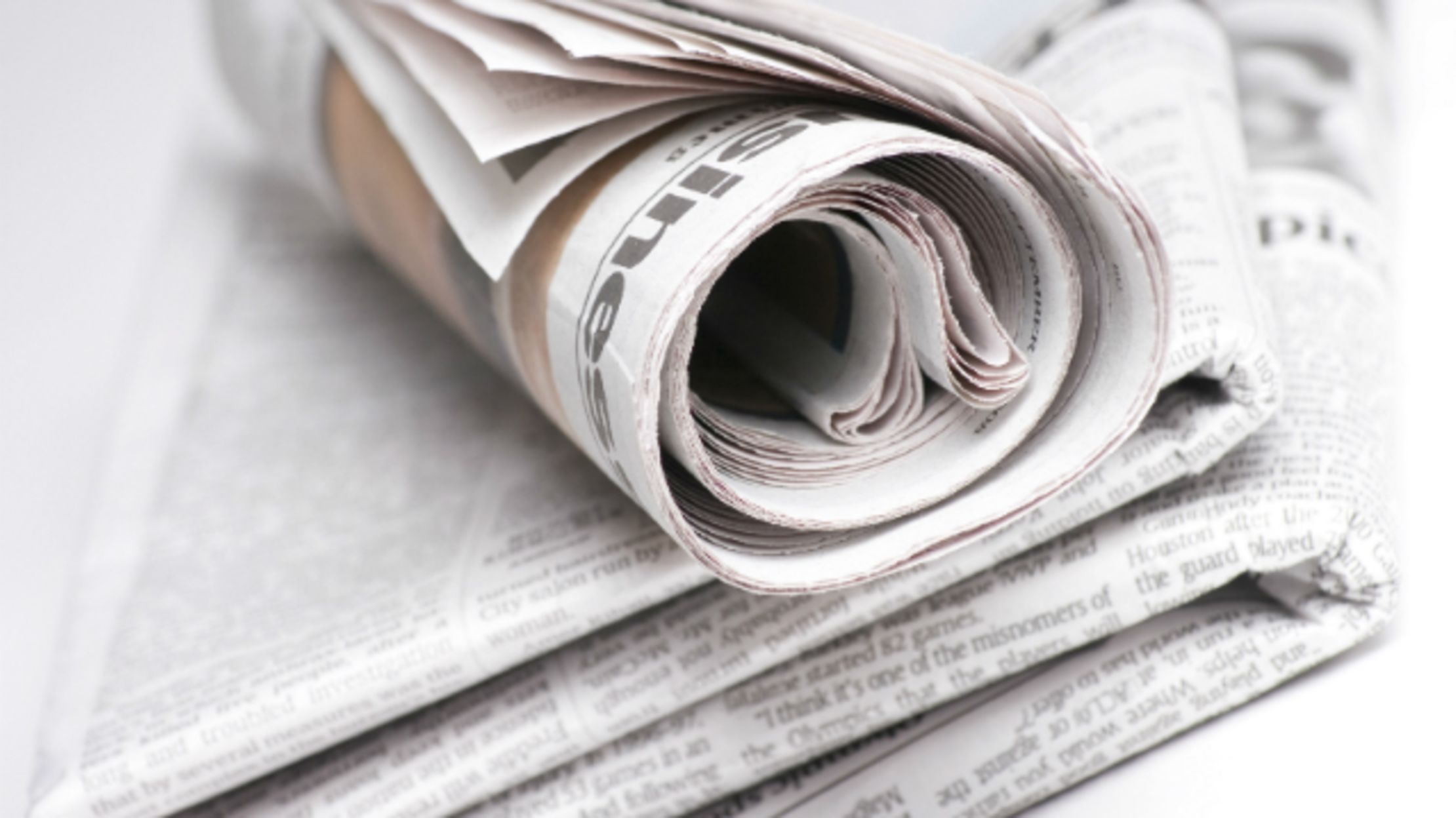 10 Effortless Uses for Yesterday's News (and 1 Challenge) Mental Floss