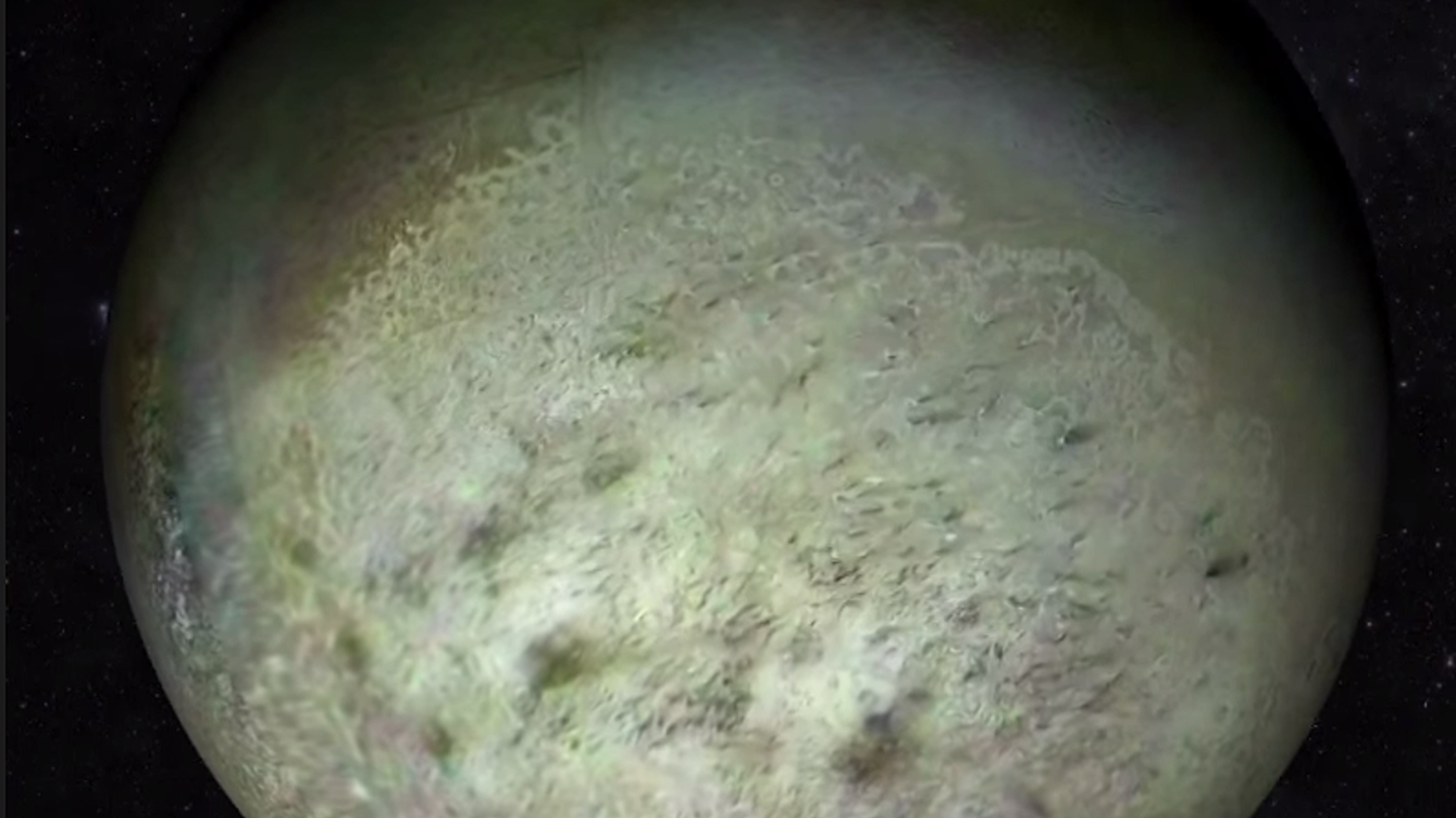 Stunning Restored Footage of Neptune s Largest Moon Mental Floss