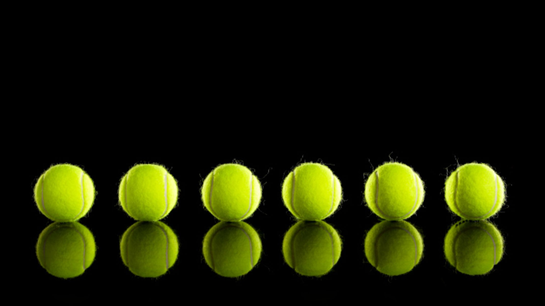 6 Unconventional Uses for the Tennis Ball Mental Floss