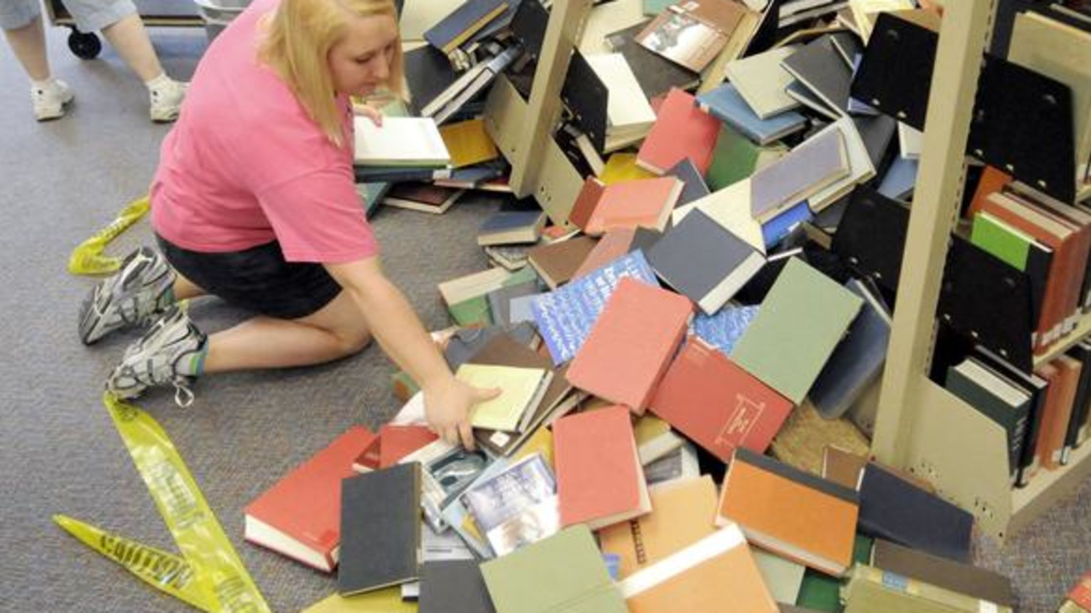 At the Libraries Reshelving 25,000 Books Mental Floss