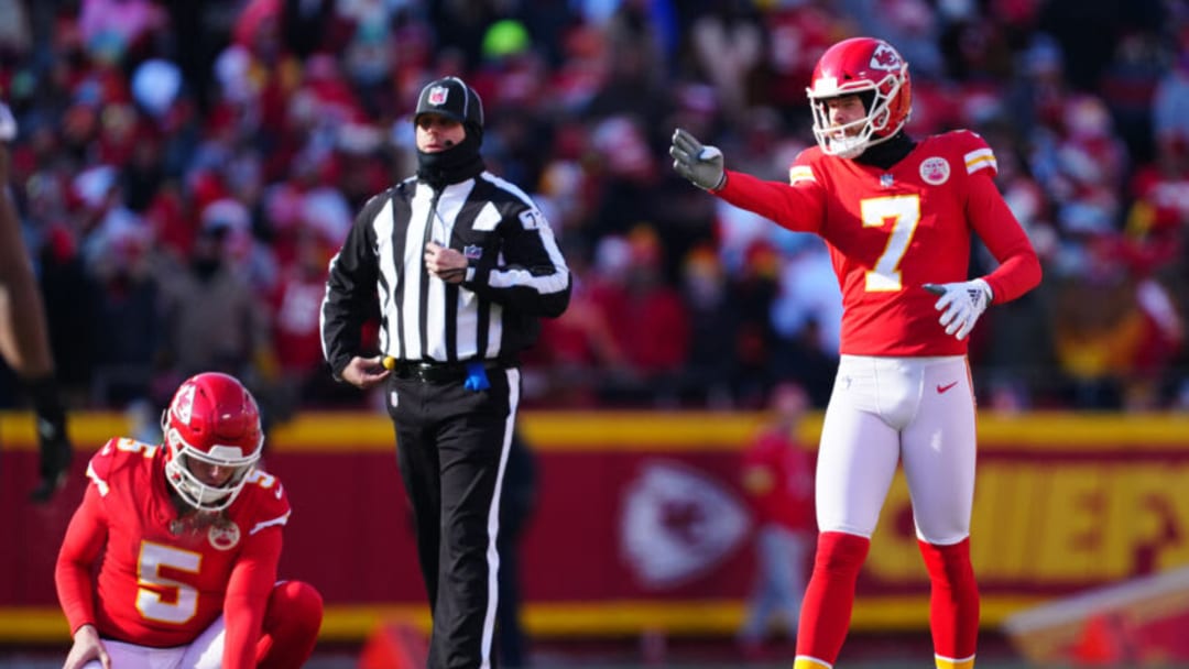 KANSAS CITY, MISSOURI - DECEMBER 24: Harrison Butker #7 of the Kansas City Chiefs lines up a field goal during the second quarter against the Seattle Seahawks at Arrowhead Stadium on December 24, 2022 in Kansas City, Missouri. (Photo by Jason Hanna/Getty Images)