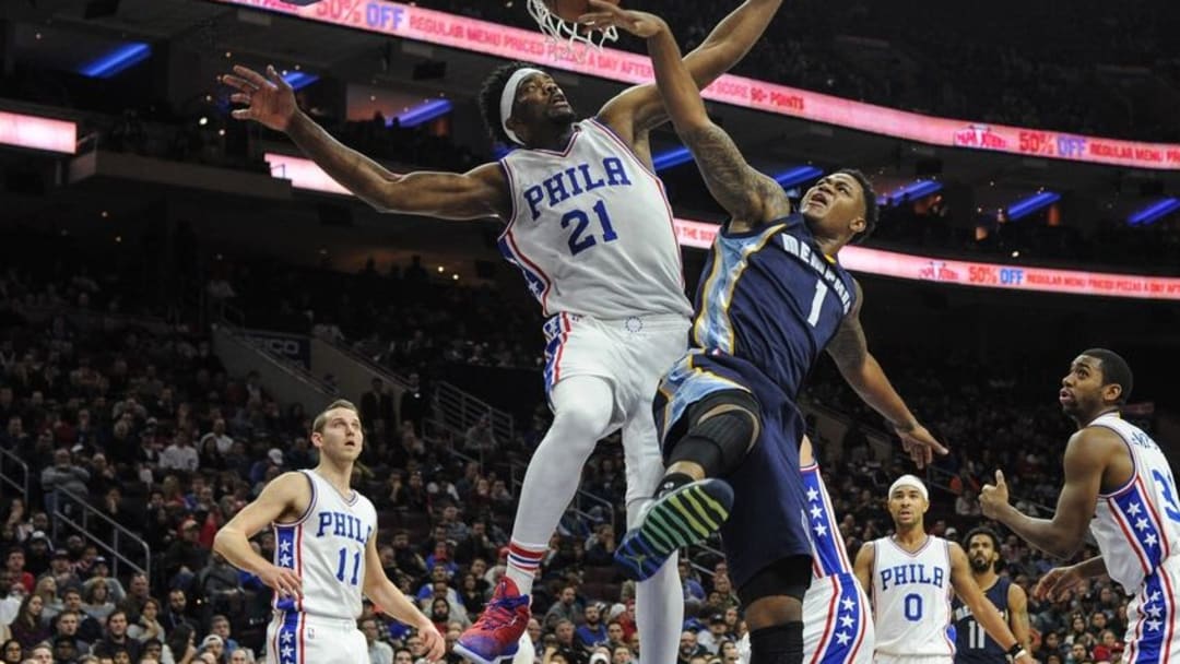 Nov 23, 2016; Philadelphia, PA, USA; Philadelphia 76ers center Joel Embiid (21) blocks a shot by Memphis Grizzlies forward Jarell Martin (1) during the first quarter of the game at the Wells Fargo Center. Mandatory Credit: John Geliebter-USA TODAY Sports