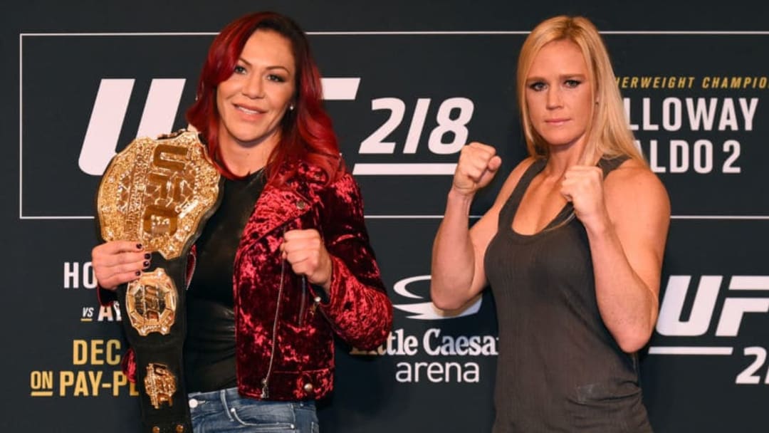 DETROIT, MI - NOVEMBER 30: (L-R) Opponents Cris Cyborg of Brazil and Holly Holm pose for photos ahead of their UFC 219 fight during the UFC 218 Ultimate Media Day at the DoubleTree Hotel on November 30, 2017 in Detroit, Michigan. (Photo by Josh Hedges/Zuffa LLC via Getty Images)