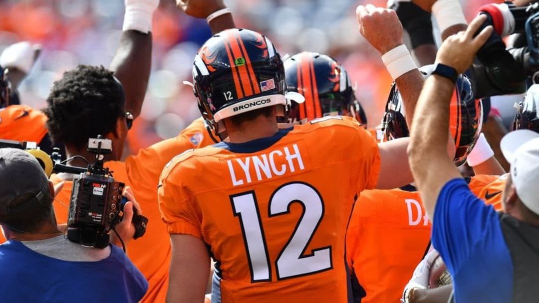 Oct 9, 2016; Denver, CO, USA; Denver Broncos quarterback Paxton Lynch (12) huddles before the game against the Atlanta Falcons at Sports Authority Field at Mile High. Mandatory Credit: Ron Chenoy-USA TODAY Sports