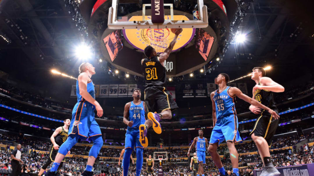 LOS ANGELES, CA - FEBRUARY 8: Thomas Bryant #31 of the Los Angeles Lakers dunks the ball during the game against the Oklahoma City Thunder on February 8, 2018 at STAPLES Center in Los Angeles, California. NOTE TO USER: User expressly acknowledges and agrees that, by downloading and/or using this Photograph, user is consenting to the terms and conditions of the Getty Images License Agreement. Mandatory Copyright Notice: Copyright 2018 NBAE (Photo by Andrew D. Bernstein/NBAE via Getty Images)