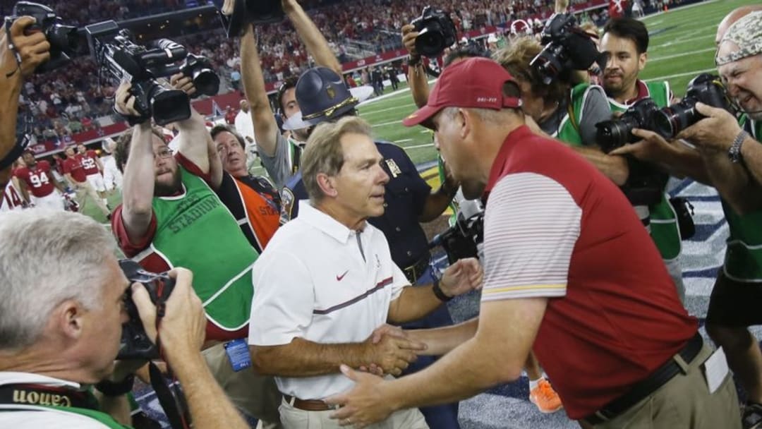 Sep 3, 2016; Arlington, TX, USA; Alabama Crimson Tide head coach Nick Saban (left) shakes hands with USC Trojans head coach Clay Helton after the game at AT&T Stadium. Mandatory Credit: Tim Heitman-USA TODAY Sports