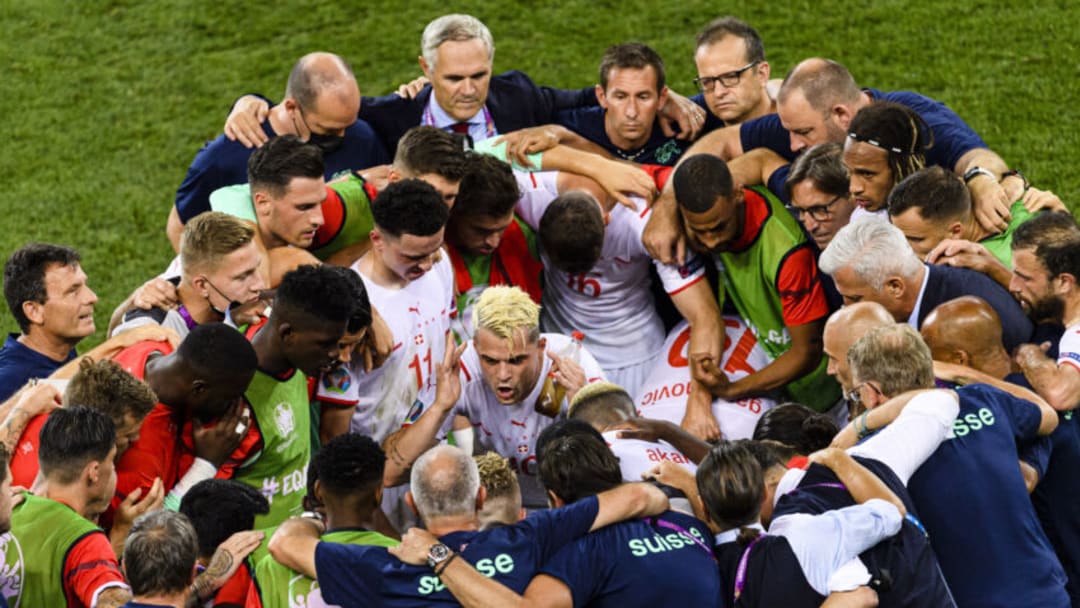 Granit Xhaka gives a pep talk to his Swiss teammates (Photo by Marcio Machado/Getty Images)