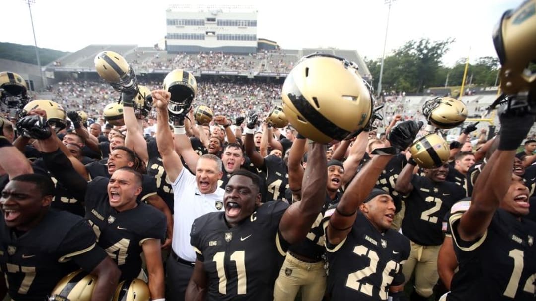 Sep 10, 2016; West Point, NY, USA; Army Black Knights linebacker nd co-captain Andrew King (11) celebrates an Army victory alongside Army Black Knights head coach Jeff Monken after West Point beat the Rice Owls 31-14 at Michie Stadium. Mandatory Credit: Danny Wild-USA TODAY Sports